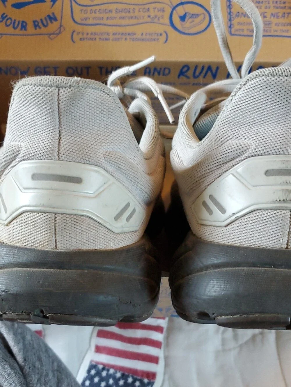 Brooks beige and white running shoes
